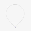 Colgante de oro blanco de 18K con zafiro azul en talla brillante de 0,23 cts y orla de 10 diamantes en talla brillante con un total de 0,07 cts