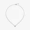 Colgante de oro blanco de 18K con diamante central en talla brillante de 0,1 cts y 12 diamantes en talla brillante con un total de 0,15 cts