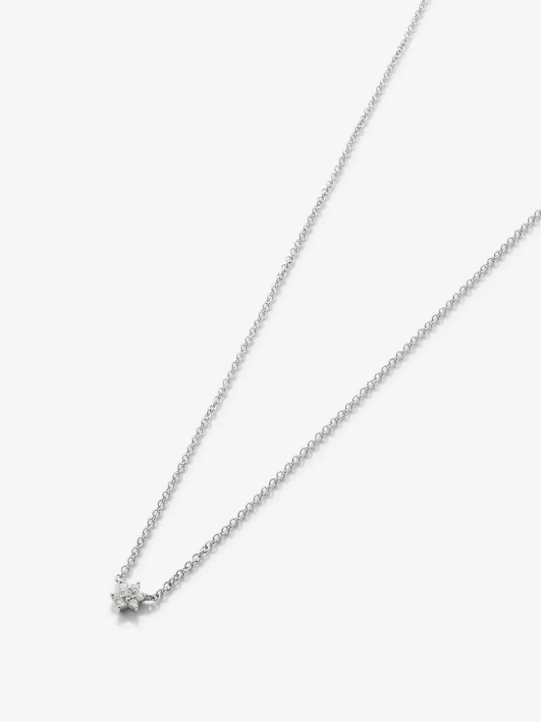 Colgante de oro blanco de 18K con diamantes 0,21 cts en forma de estrella