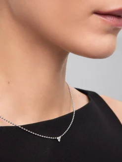 Colgante de oro blanco de 18K con 3 diamantes en talla brillante con un total de 0,18 cts