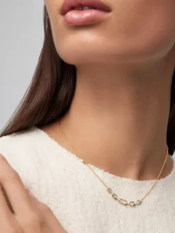 Colgante de oro blanco y amarillo de 18K con diamantes blancos en talla brillante de 0,11 cts