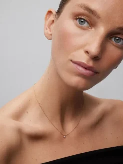 Colgante de oro rosa de 18K con diamante en talla brillante de 0,15 cts