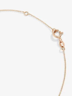 Collar de oro rosa de 18K con 4 diamantes en talla brillante con un total de 0,1 cts