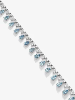 Collar rivière de oro blanco de 18K con 25 aguamarinas azules en talla pera con un total de 8,33 cts, 39 en talla brillante con un total de 5,868 cts y 103 diamantes en talla brillante con un total de 3,82 cts