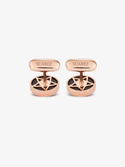 Gemelos de oro rosa de 18K con ónix negro y 2 diamantes en talla brillante con un total de 0,006 cts