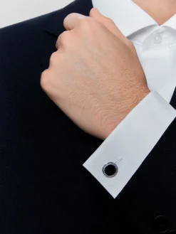 Gemelos de plata 925 con 2 ónix con un total de 4,24 cts y 48 zafiros azules en talla brillante con un total de 0,68 cts