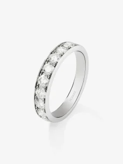 Media alianza de oro blanco de 18K con 9 diamantes en talla brillante con un total de 0,9 cts