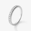 Media alianza de oro blanco de 18K con 16 diamantes en talla brillante con un total de 0,29 cts
