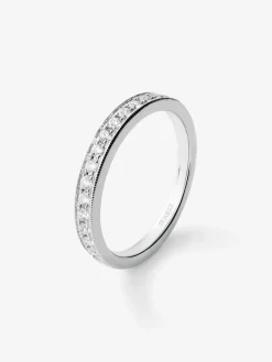 Media alianza de oro blanco de 18K con 16 diamantes en talla brillante con un total de 0,29 cts