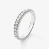 Media alianza de oro blanco de 18K con 13 diamantes en talla brillante con un total de 0,27 cts