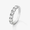 Media alianza de oro blanco de 18K con 8 diamantes en talla brillante con un total de 1,6 cts