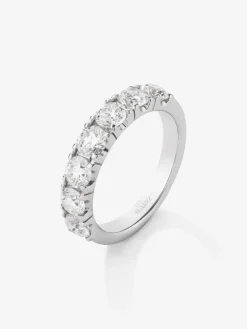 Media alianza de oro blanco de 18K con 7 diamantes en talla brillante con un total de 1,77 cts