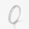 Media alianza de oro blanco de 18K con 19 diamantes en talla princesa con un total de 0,29 cts