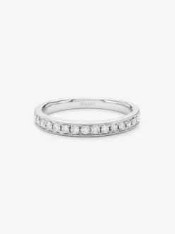 Media alianza de oro blanco de 18K con 16 diamantes en talla brillante con un total de 0,29 cts