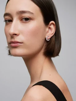 Pendientes de aro abiertos peque&ntilde;os de oro blanco de 18K con pavé de diamantes