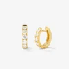 Pendientes de aro de oro amarillo de 18K con 12 diamantes en talla brillante con un total de 0,65 cts