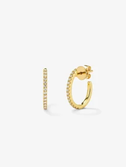 Pendientes de aro de oro amarillo de 18K con 28 diamantes en talla brillante con un total de 0,22 cts