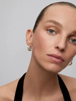 Pendientes de aro de oro amarillo de 18K con 40 diamantes en talla brillante con un total de 0,37 cts