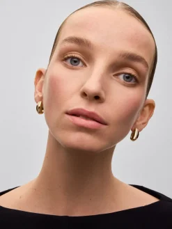 Pendientes de aro de oro amarillo de 18K con pavé de diamantes en talla brillante