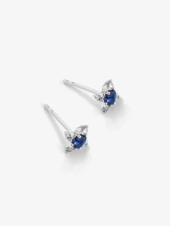 Pendientes de aro de oro blanco de 18K con 2 zafiros azules en talla brillante con un total de 0,26 cts y 8 diamantes en talla brillante con un total de 0,16 cts