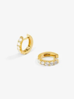 Pendientes de aro de oro amarillo de 18K con 12 diamantes en talla brillante con un total de 0,65 cts
