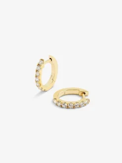 Pendientes de aro de oro amarillo de 18K con 14 diamantes blancos en talla brillante con un total de 0,39 cts