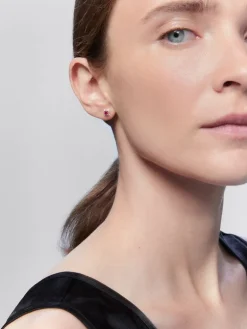 Pendientes de aro de oro rosa de 18K con 2 rub&iacute;es rojos en talla brillante con un total de 0,29 cts y 8 diamantes en talla brillante con un total de 0,17 cts