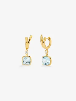 Pendientes de oro amarillo de 18K con topacios azul sky en talla cushion y 2 diamantes en talla brillante con un total de 0,21 cts