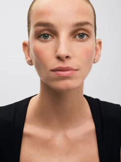 Pendientes de oro blanco de 18K con diamante solitario