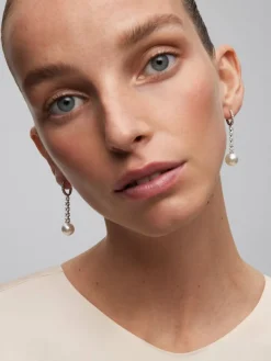 Pendientes de oro blanco de 18K con diamantes en talla brillante de 0,4 cts y perlas australianas de 10,5 mm
