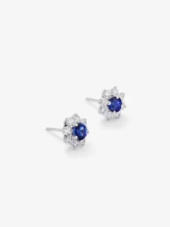 Pendientes de oro blanco de 18K con zafiros azules en talla brillante de 0,92 cts y diamantes 0,76 cts en forma de estrella
