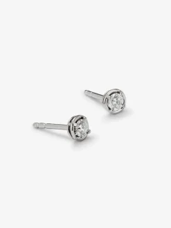 Pendientes de oro blanco de 18K con diamante solitario