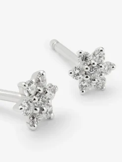 Pendientes de oro blanco de 18K con diamantes en talla brillante de 0,2 cts con forma de estrella