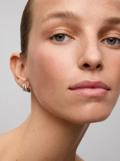 Pendientes de oro blanco de 18K con pavé de diamantes en talla brillante con un total de 0,52 cts