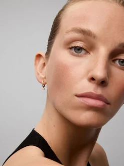 Pendientes de oro rosa de 18K con 20 diamantes en talla brillante con un total de 0,38 cts