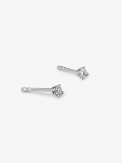 Pendientes solitarios de oro blanco de 18K con 2 diamantes en talla brillante con un total de 0,1 cts