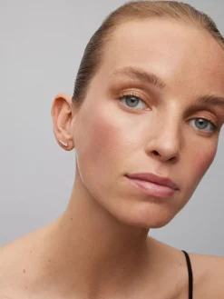 Pendientes trepadores de oro rosa de 18K con diamantes