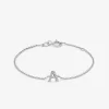 Pulsera cadena con inicial de oro blanco de 18K y diamantes