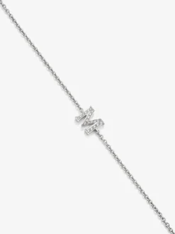 Pulsera cadena con inicial de oro blanco de 18K y diamantes
