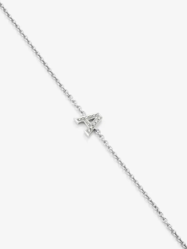 Pulsera cadena con inicial de oro blanco de 18K y diamantes