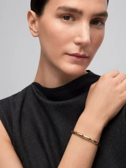 Pulsera de oro amarillo de 18K con rub&iacute;es en talla brillante de 1,2 cts