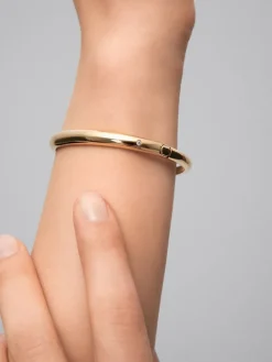 Pulsera de oro amarillo de 18K con diamante en talla brillante de 0,02 cts