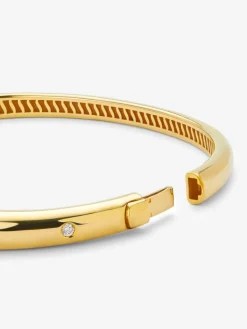 Pulsera de oro amarillo de 18K con diamante en talla brillante de 0,02 cts