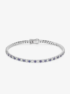 Pulsera de oro blanco de 18K con 37 diamantes en talla brillante con un total de 0,88 cts y 38 zafiros azules en talla brillante con un total de 0,95 cts