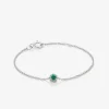 Pulsera de oro blanco de 18K con esmeralda en talla brillante de 0,1 cts y diamantes en talla brillante de 0,05 cts
