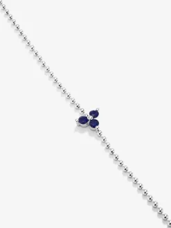 Pulsera de oro blanco de 18K con zafiro azul en talla brillante de 0,38 cts
