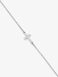 Pulsera de oro blanco de 18K con 11 diamantes en talla brillante con un total de 0,04 cts y cruz