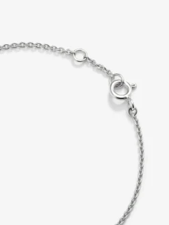 Pulsera de oro blanco de 18K con rub&iacute; 0,21 cts y diamantes 0,06 cts