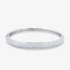 Pulsera r&iacute;gida de media ca&ntilde;a de oro blanco de 18K con pavé de diamantes