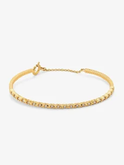 Pulsera r&iacute;gida de oro amarillo de 18K con 21 diamantes en talla brillante con un total de 0,29 cts